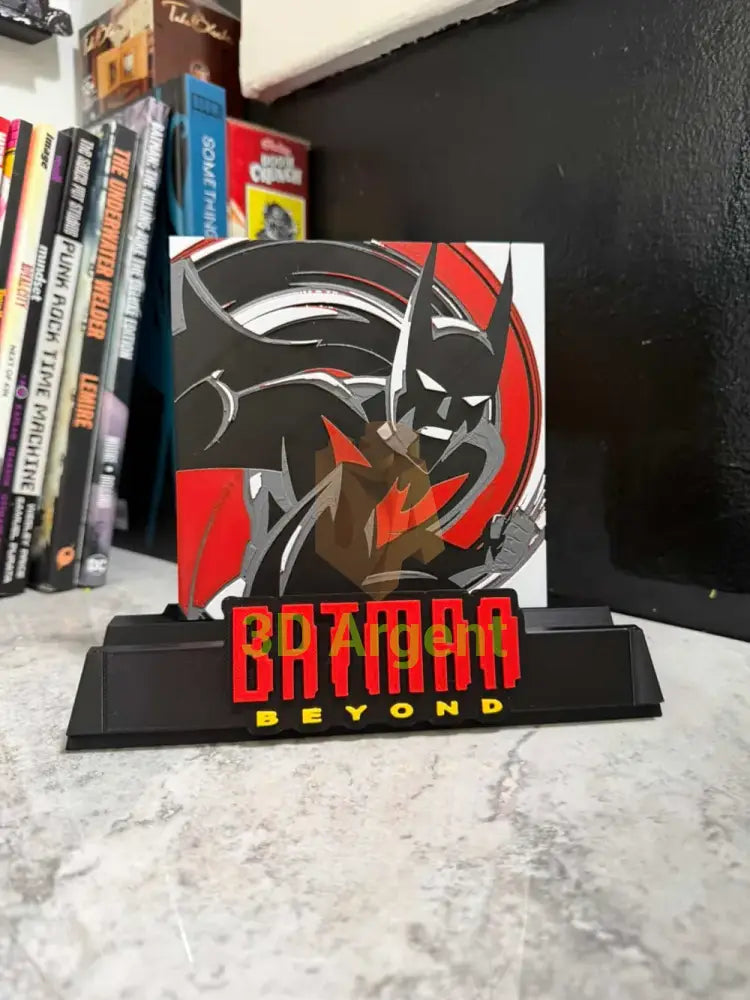 Close-up front view of the Batman Beyond comic display stand showing the multi-colour illustration and wordmark
