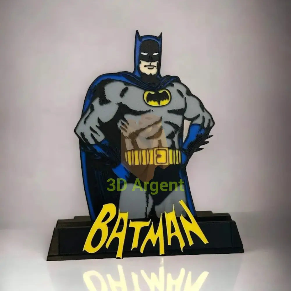 Front view of the Batman comic display stand showing the multi-colour Batman figure and wordmark