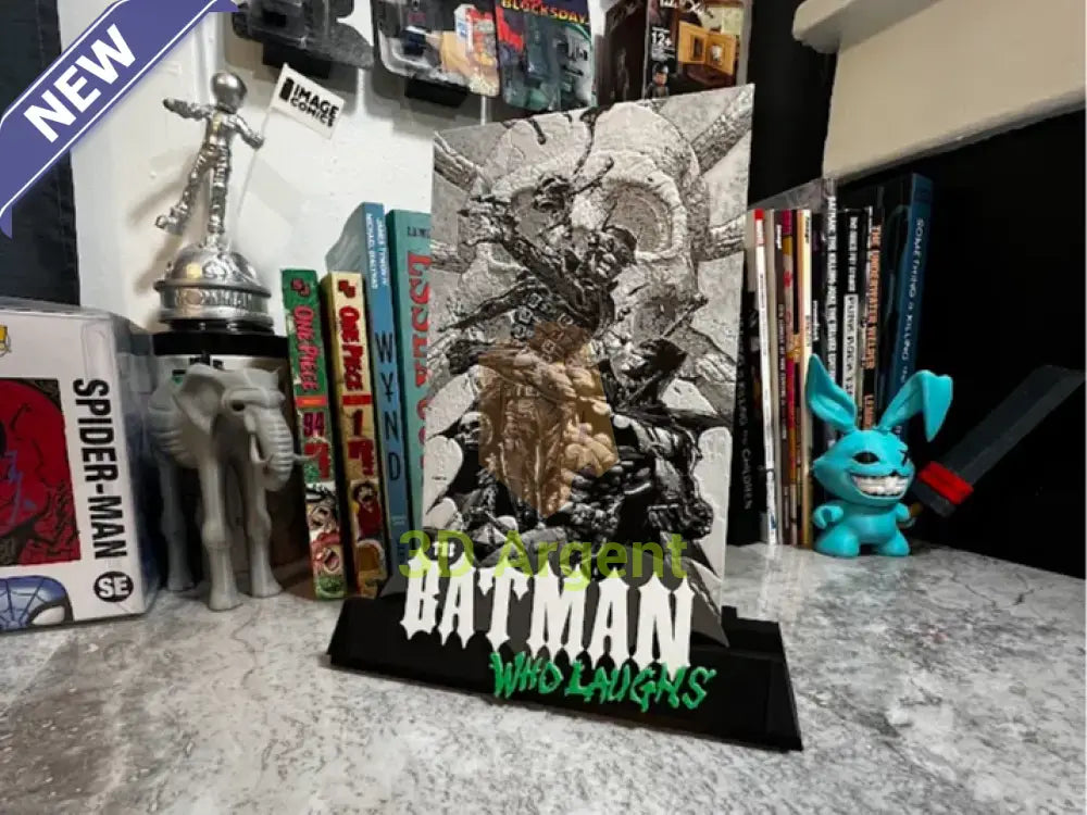 Batman Who Laughs comic display stand with detailed textured illustration panel and THE BATMAN WHO LAUGHS wordmark base