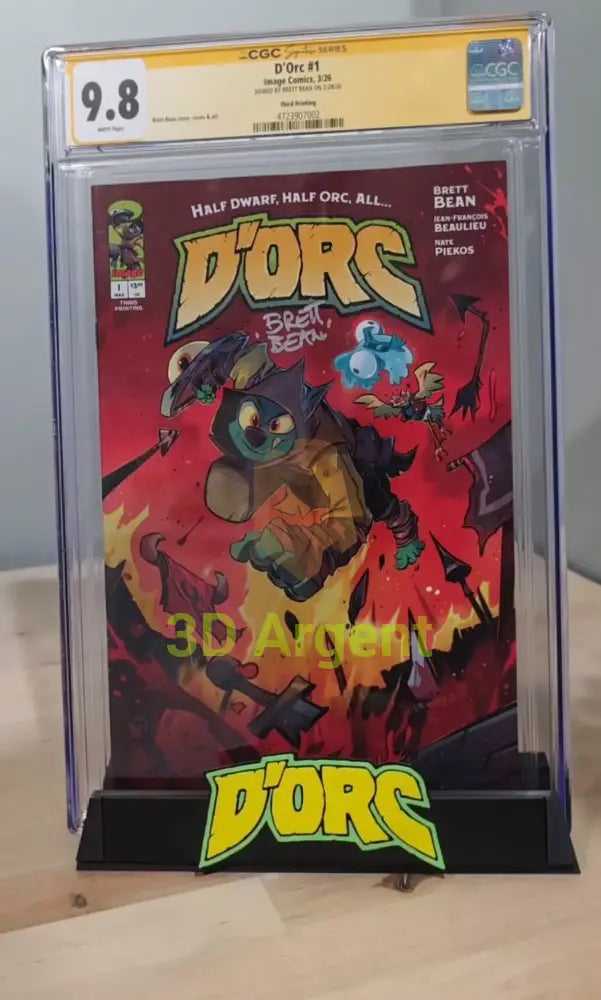 D'Orc comic display stand holding a CGC-graded comic slab, front logo plate visible
