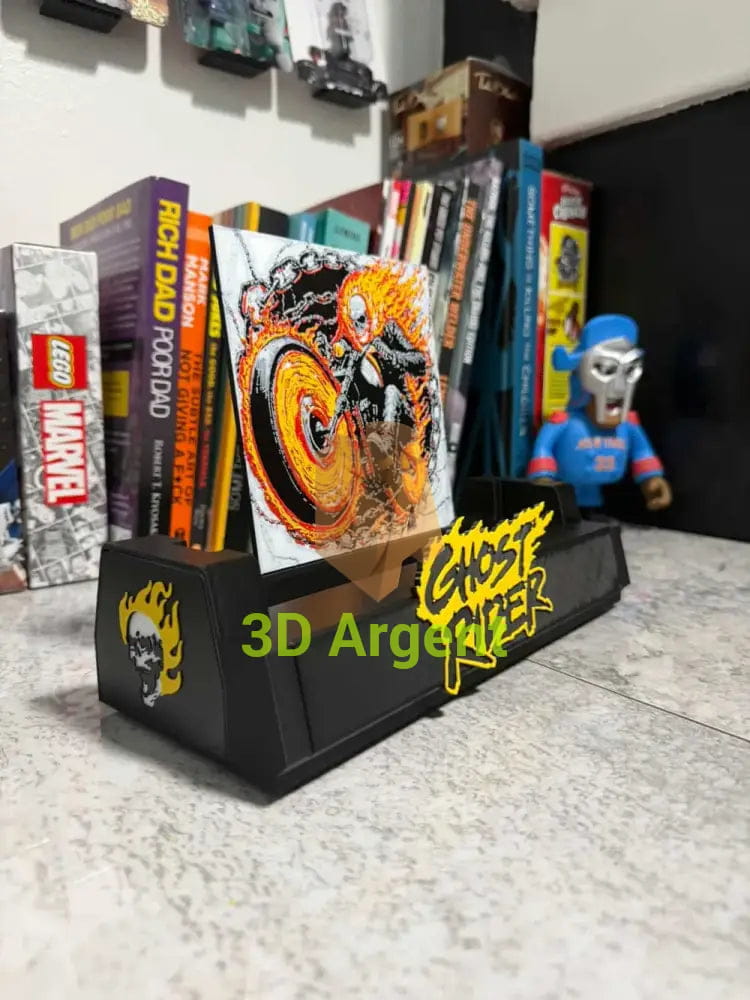 Angled view of the Ghost Rider comic display stand showing the side flame-skull emblem and GHOST RIDER wordmark