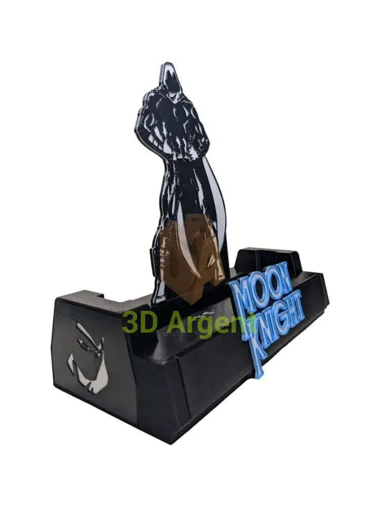 Angled view of the Moon Knight comic display stand showing the figure and crescent moon side detail