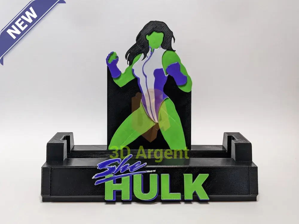 She-Hulk comic display stand with detailed multi-colour She-Hulk figure and SHE HULK wordmark base