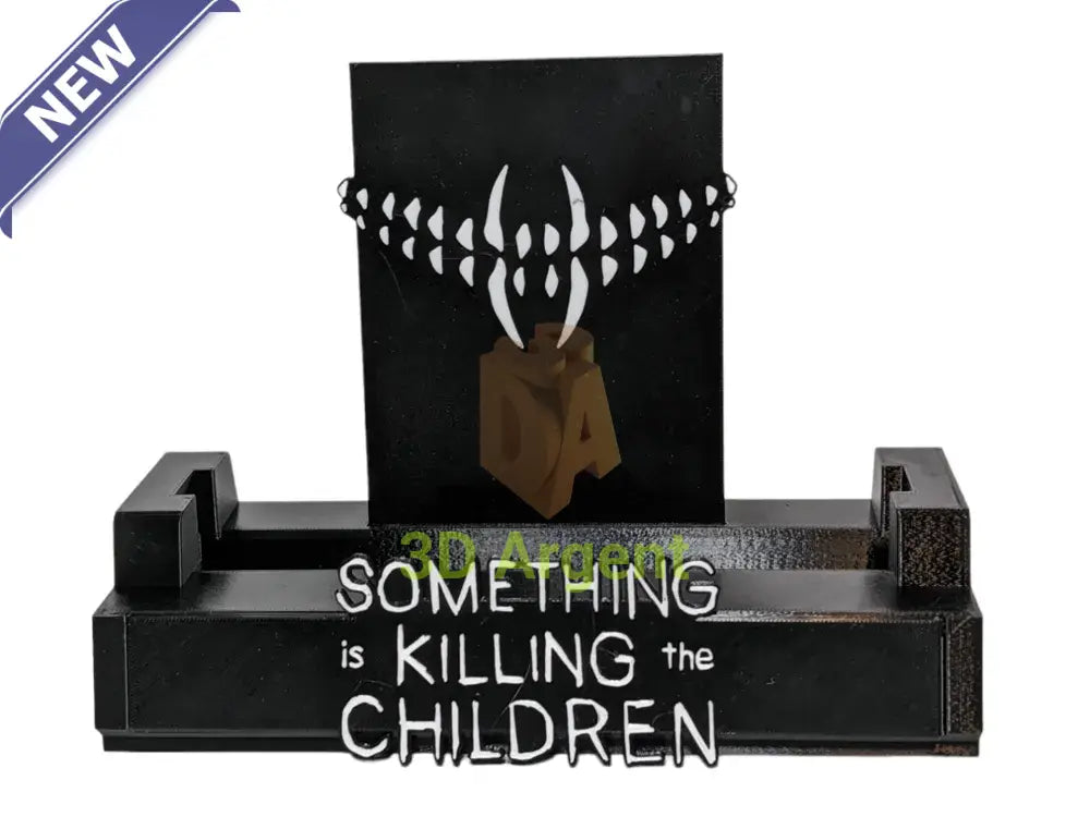 Something is Killing the Children comic display stand with fang backdrop design and wordmark base