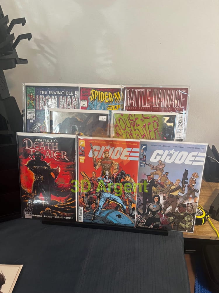 Stadium Stand – comic books displayed on black 3-tier stand