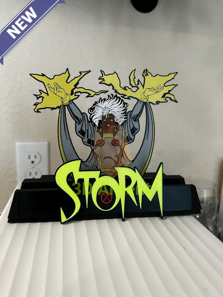 Storm comic display stand with detailed multi-colour Storm figure and STORM wordmark base