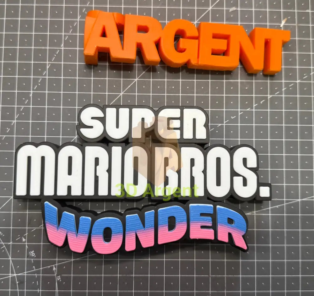 Super Mario Wonder Logo Sign – 3D Printed Multi-Colour Display Stand Collectables:Science Fiction Collectables:Other
