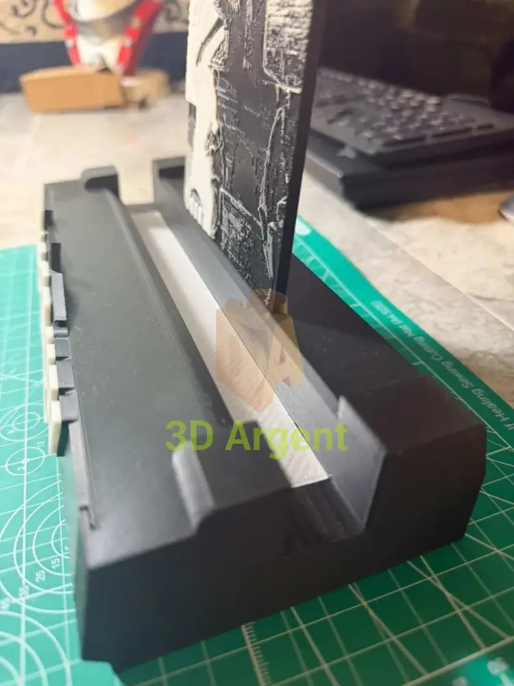 Close-up of The Crow comic display stand's slab channel and LED strip groove