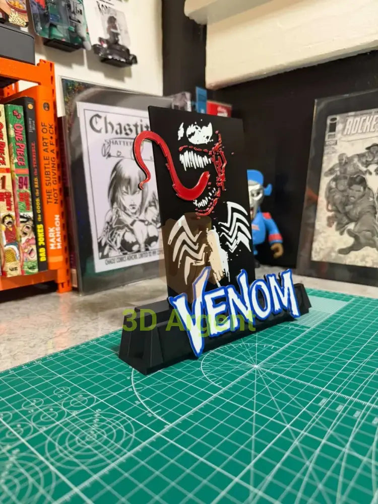 Angled view of the Venom comic display stand, multi-colour PLA print with VENOM wordmark base